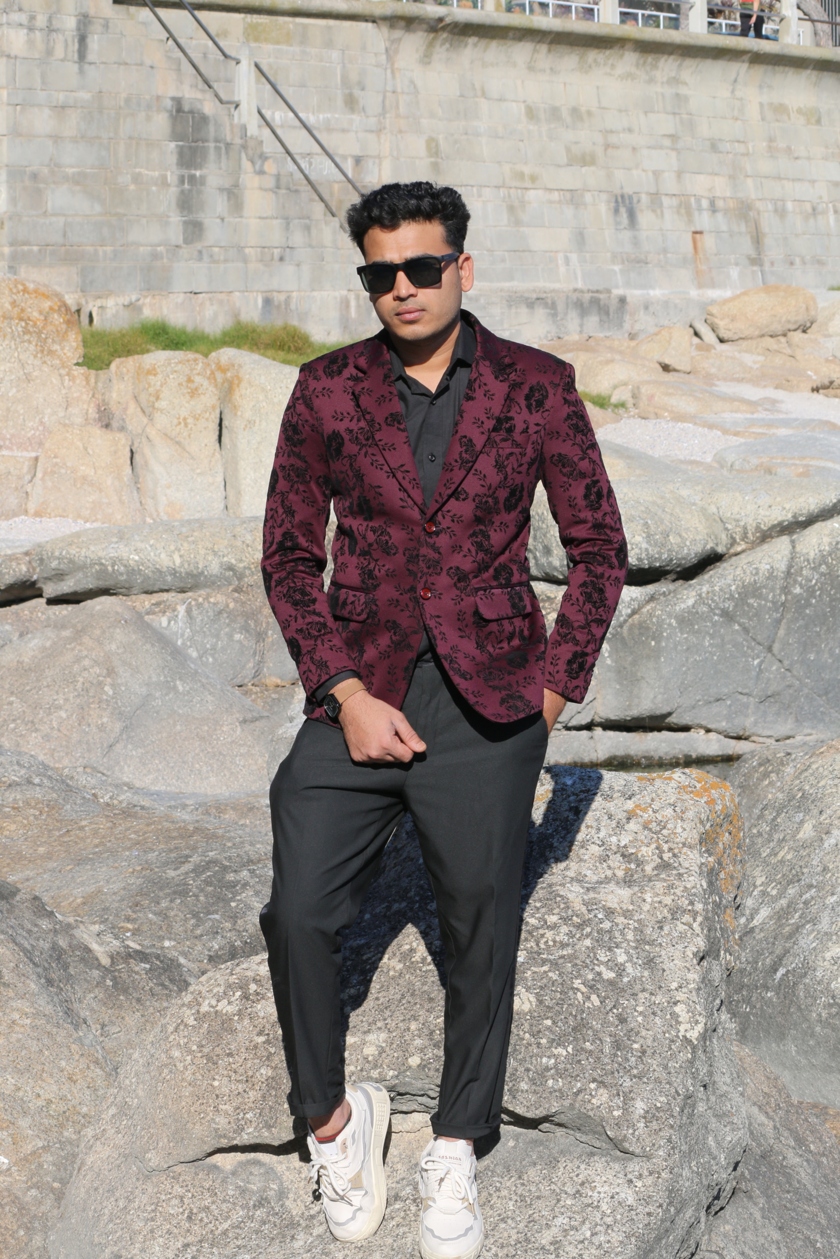Stylish man wearing a made-to-measure maroon floral blazer by Smart Tailor in Cape Town.
